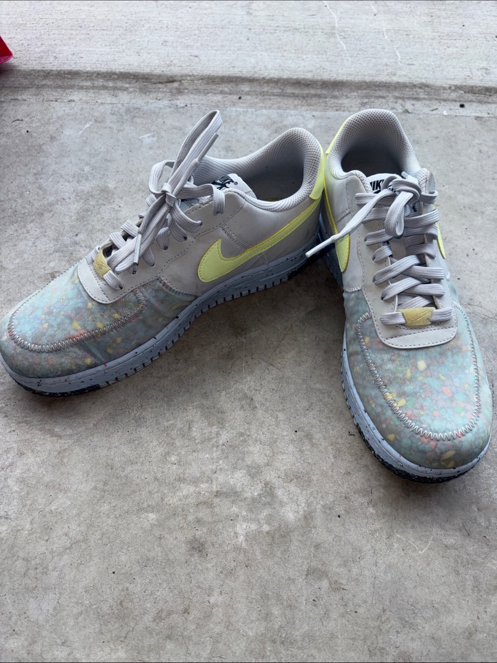 Nike Women’s Air Force 1 Sneakers in Light Gray with Yellow Swoosh
